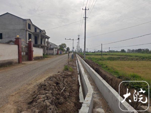 新宝配资 王祖贤捐资修建的家乡马路升级改造竣工，从单车道升级为双车道